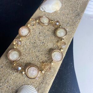 Elegant Gold and Cream Bracelet